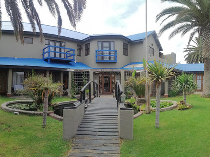 22 On Main Guesthouse Walvis Bay, Face, Person, One Face, Portrait, House, Building, Architecture, Palm Tree, Plant, Nature, Wood, Frontal Face, Female, Adult, Eyes Closed