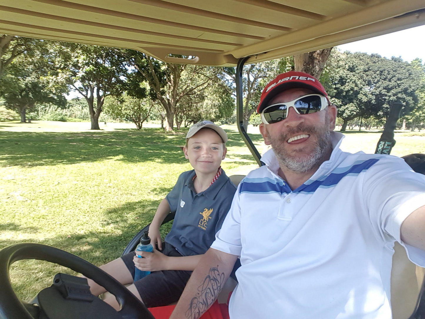 Complementary Colors, Ball Game, Sport, Golfing, Person, Face, Two Faces, Frontal Face, Male, Eyes Open, Smile, Child, Adult, Beard, Sunglasses, Durban Golf Club, 256 New Germany Rd, Recreation, Durban, 4090