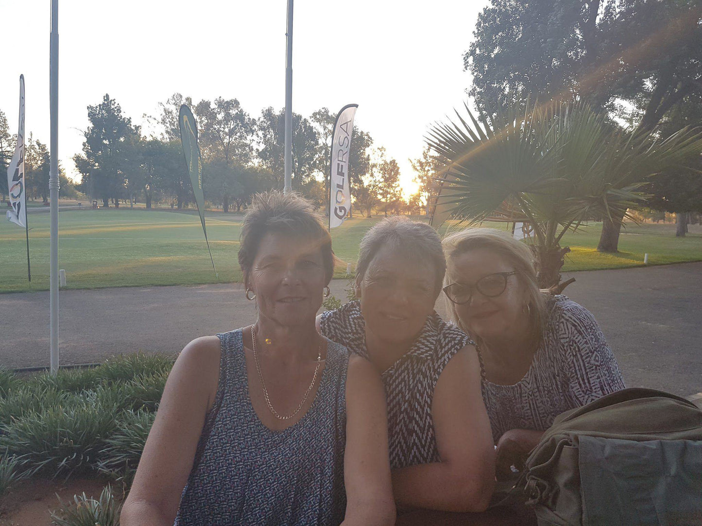 Nature, Ball Game, Sport, Golfing, Person, Palm Tree, Plant, Wood, Face, Unsaturated, Group, Three Faces, Frontal Face, Female, Adult, Eyes Closed, Glasses, Male, Smile, Kimberley Golf Club, N12, Kimberley, 8300