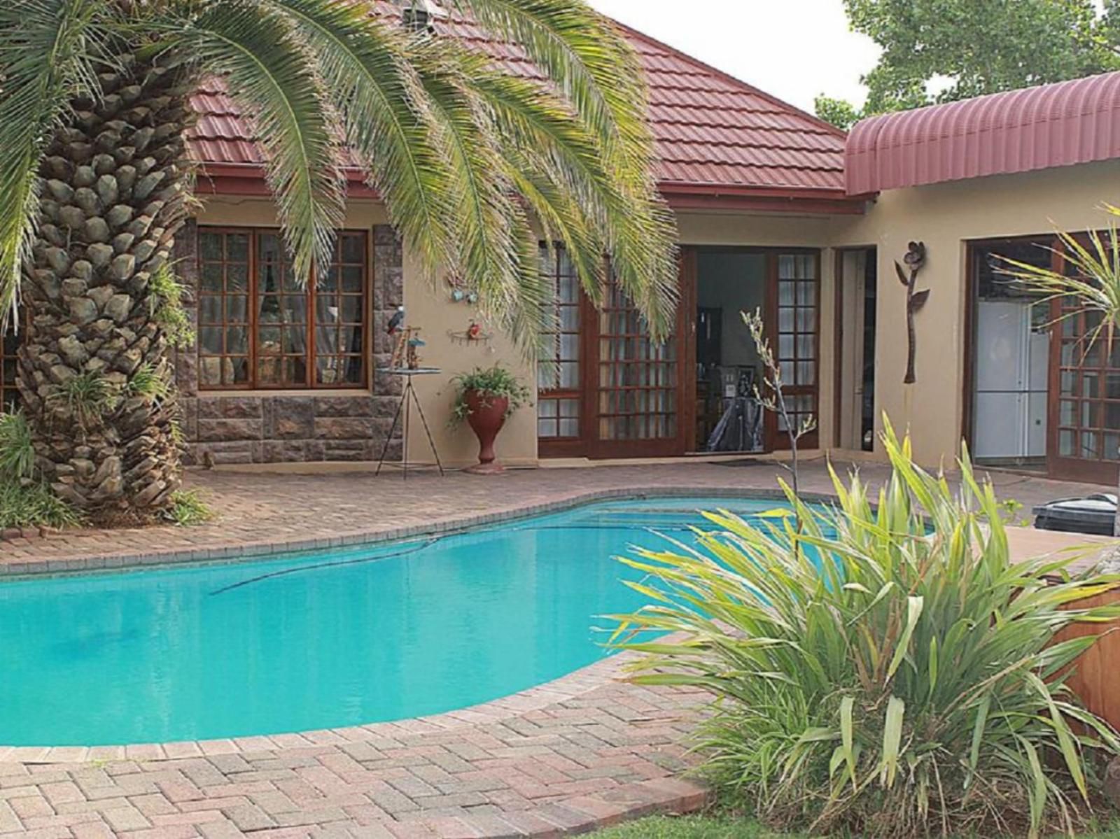 A Cherry Lane Self Catering And Bandb Ferreira Bloemfontein Free State South Africa House, Building, Architecture, Palm Tree, Plant, Nature, Wood, Garden, Swimming Pool