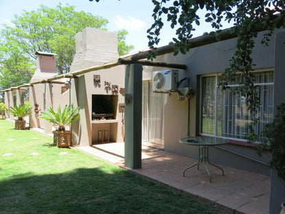 A Cherry Lane Self Catering And Bandb Ferreira Bloemfontein Free State South Africa House, Building, Architecture, Palm Tree, Plant, Nature, Wood, Garden