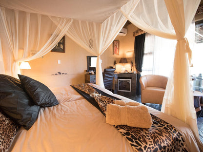 African Rock Lodge, Deluxe King room, Bedroom