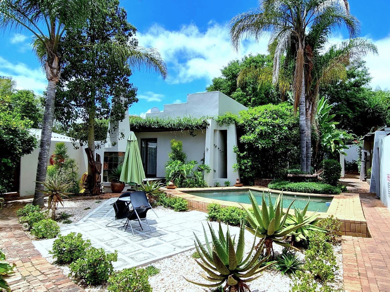 African Roots Guest House, House, Building, Architecture, Palm Tree, Plant, Nature, Wood, Garden