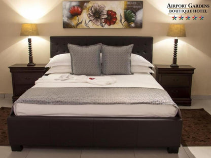 Airport Gardens Boutique Hotel, DeLuxe Double Room, Bedroom