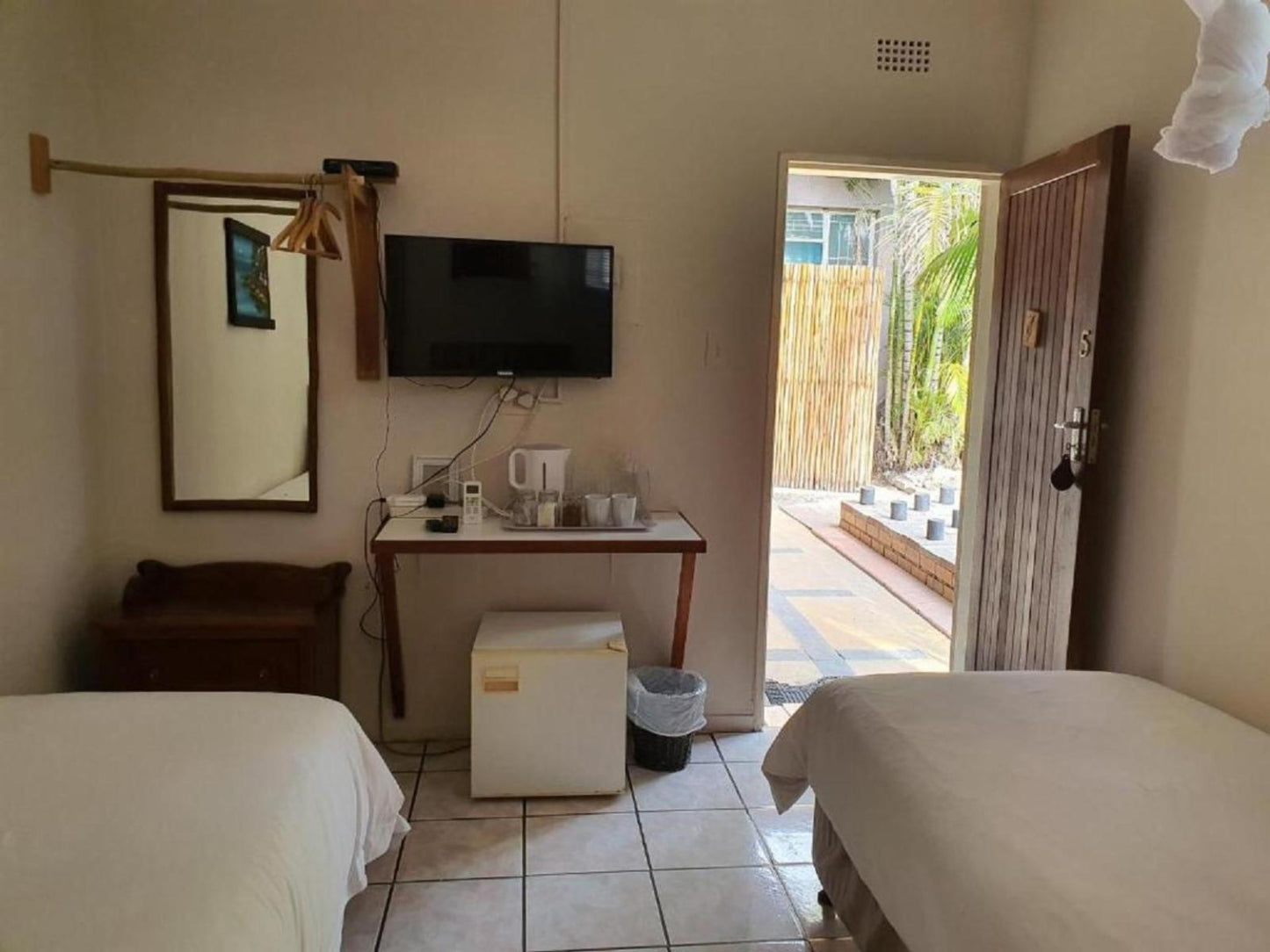 Budget Twin Room with Outdoor Shower 5 @ A Travellers Palm