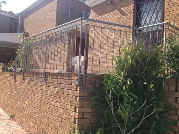 Blue Fern Of Knysna Costa Sarda Knysna Western Cape South Africa Chicken, Bird, Animal, Agriculture, Farm Animal, Cat, Mammal, Pet, Dog, Gate, Architecture, House, Building, Primate, Wall, Brick Texture, Texture, Framing, Garden, Nature, Plant