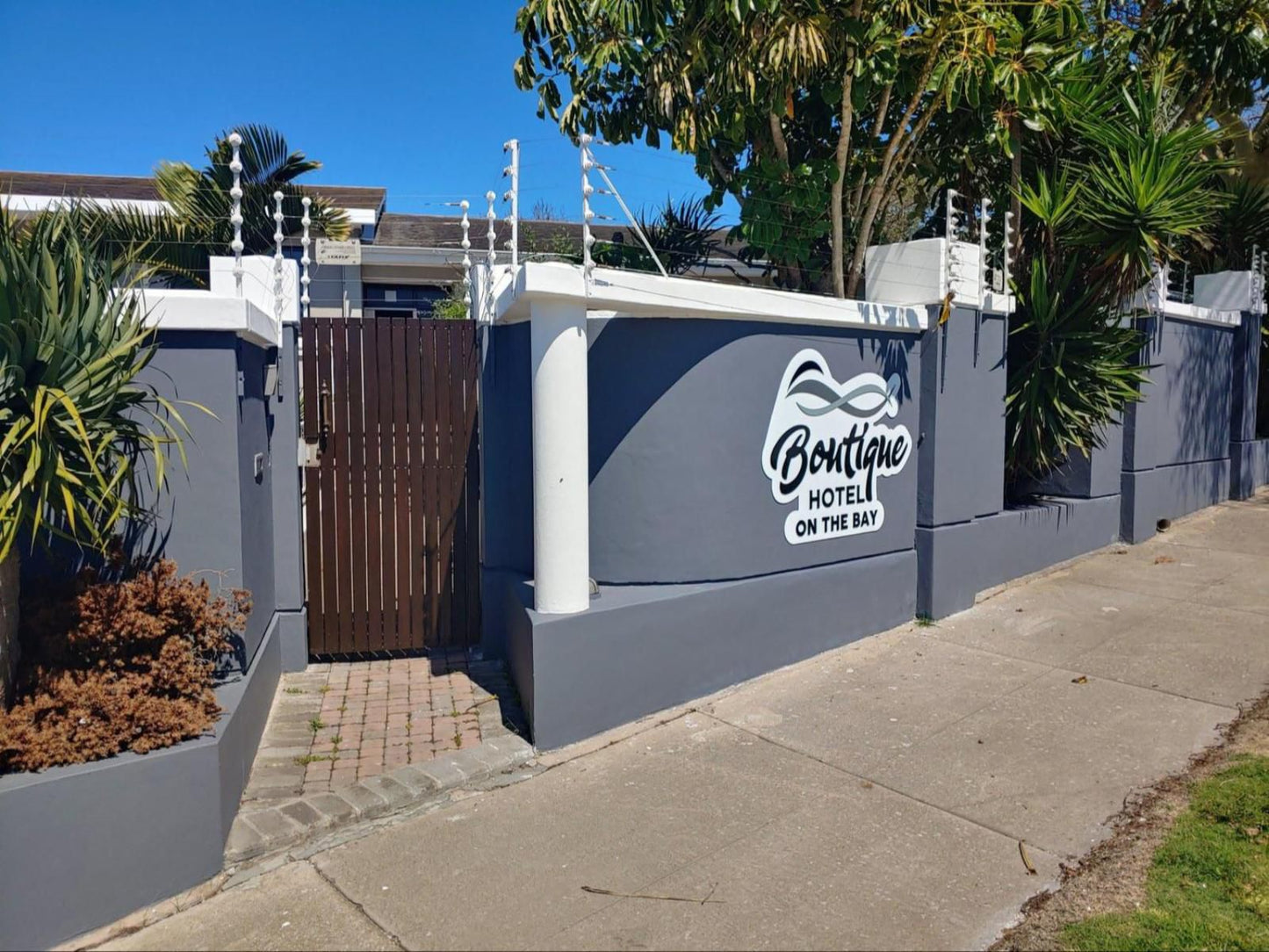 Boutique Hotel On The Bay Humewood Port Elizabeth Eastern Cape South Africa House, Building, Architecture, Palm Tree, Plant, Nature, Wood, Sign