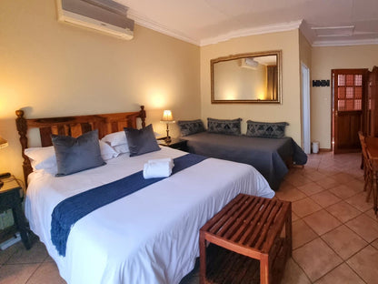 Deluxe Tri-room with private patio @ Camelia Guest House