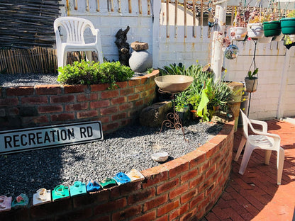 Cape Capsules Backpackers And Pizzeria Muizenberg Cape Town Western Cape South Africa House, Building, Architecture, Sign, Brick Texture, Texture, Garden, Nature, Plant, Street