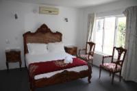 Standard Queen Room with Terrace @ Capital House Boutique Hotel