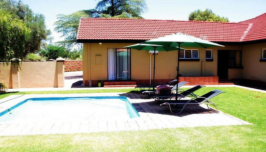 Fancy Yellow Guest House Monument Heights Kimberley Northern Cape South Africa House, Building, Architecture, Palm Tree, Plant, Nature, Wood, Swimming Pool