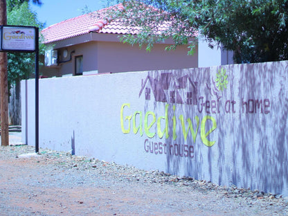 Gaediwe Guesthouse, Sign, Text, Wall, Architecture