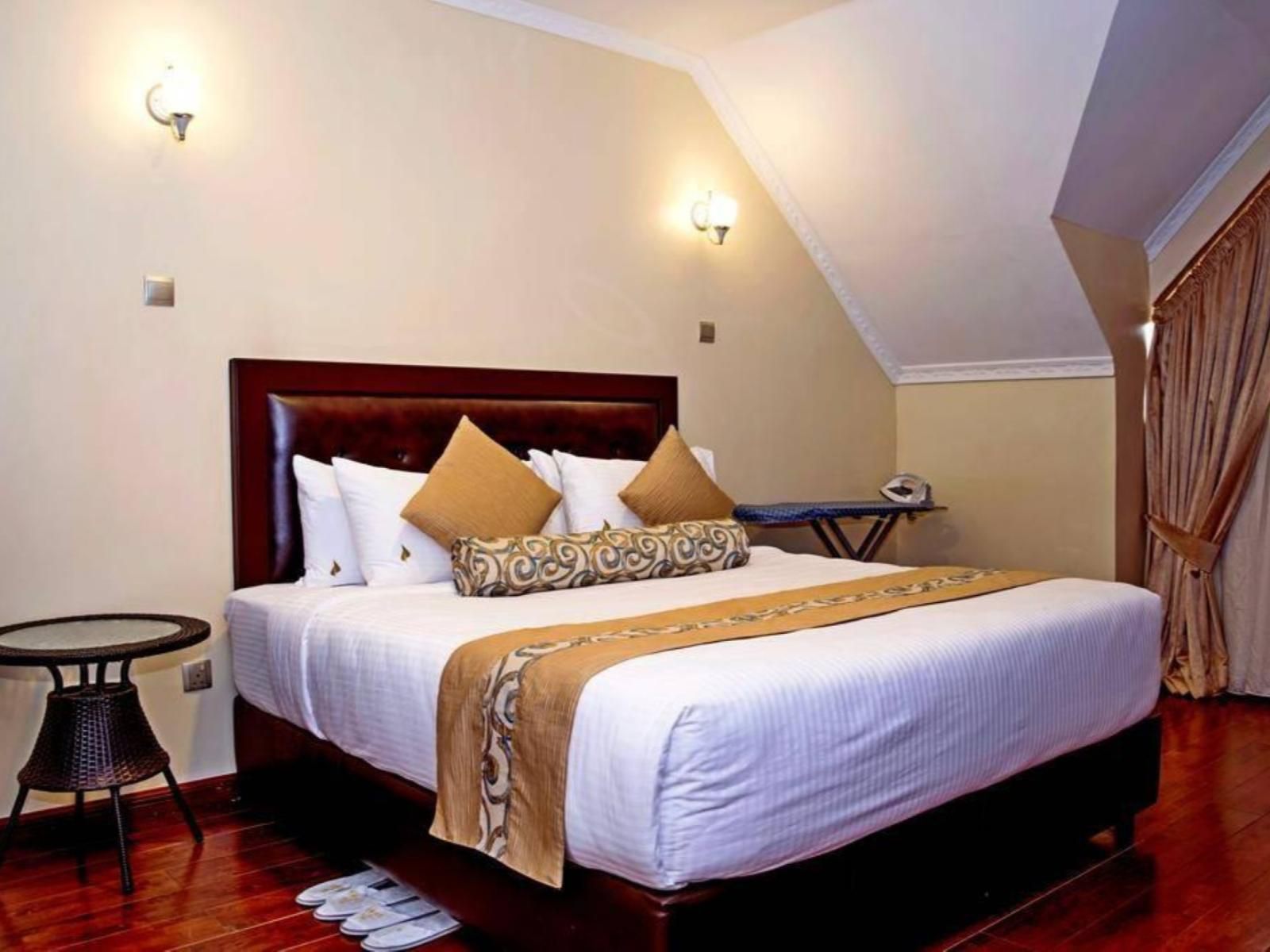 Gramo Suites, Deluxe One Bedroom Apartments, Bedroom