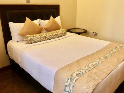 Gramo Suites, Deluxe One Bedroom Apartments, Bedroom