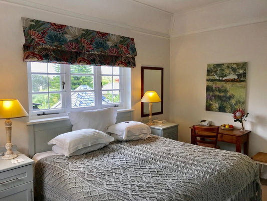 Upstairs room with covered verandah @ Hedge House