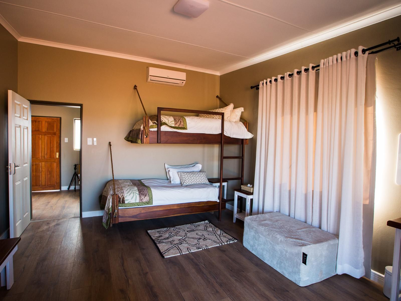 Kalahari Anib Lodge, Gondwana Collection Namibia, Standard 4 bed family Room, Bedroom