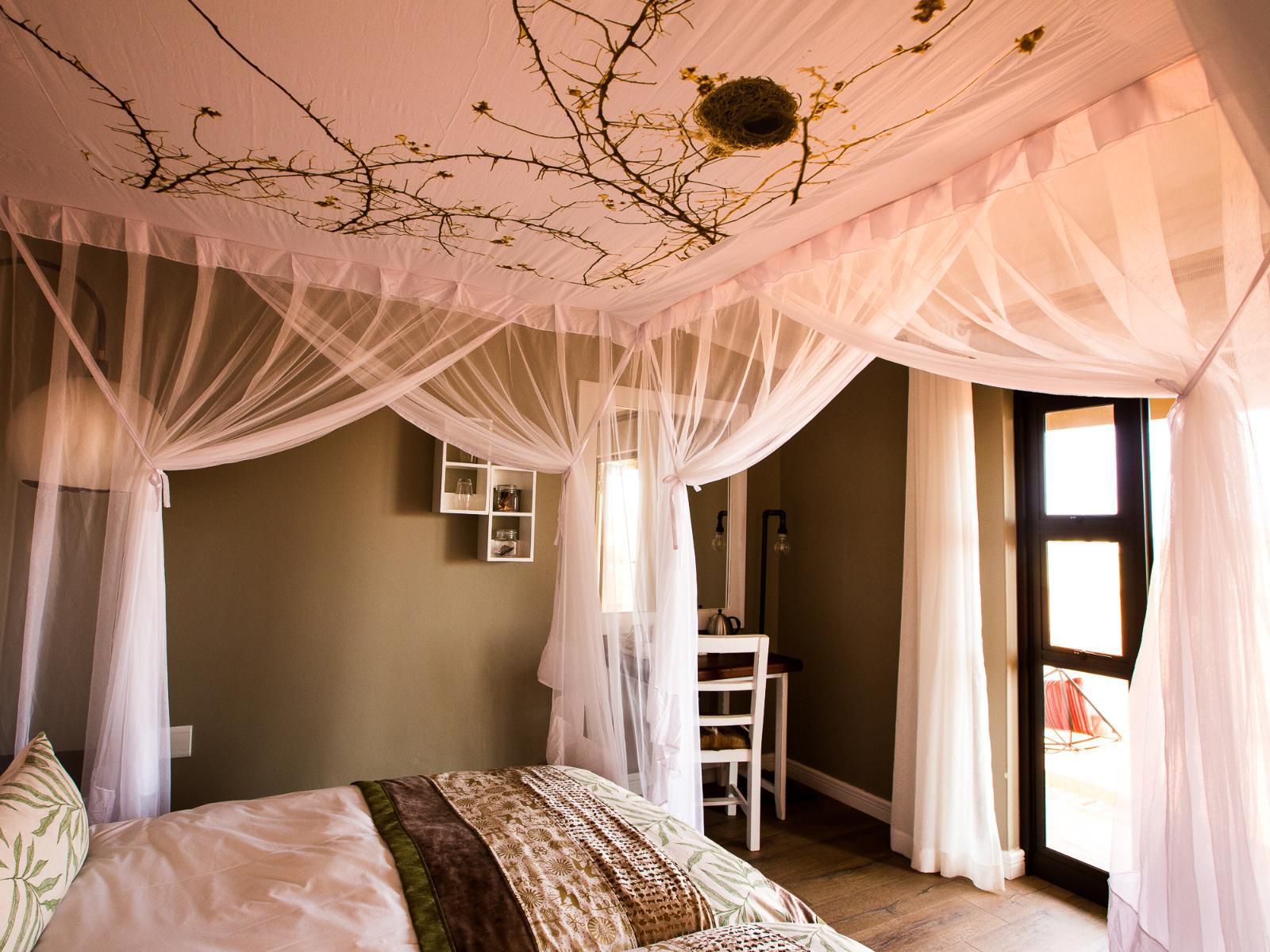 Kalahari Anib Lodge, Gondwana Collection Namibia, Standard 4 bed family Room, Bedroom