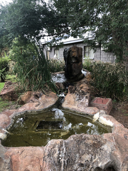 Kalahari Lodge Kimberley Northern Cape South Africa Cabin, Building, Architecture, Fountain, Waterfall, Nature, Waters, Garden, Plant