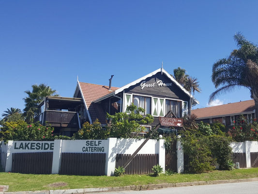 Lakeside Motel And Self Catering Knysna Western Cape South Africa Building, Architecture, House, Palm Tree, Plant, Nature, Wood, Sign, Window