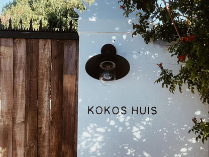 Kokos Huis, Sign