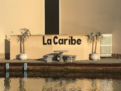 La Caribe 58 Marina Martinique Jeffreys Bay Eastern Cape South Africa Sepia Tones, Fountain, Architecture, Palm Tree, Plant, Nature, Wood, Sign