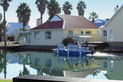 Waterside Living Marina Martinique 1297 Marina Martinique Jeffreys Bay Eastern Cape South Africa House, Building, Architecture, Lake, Nature, Waters, Palm Tree, Plant, Wood, Swimming Pool