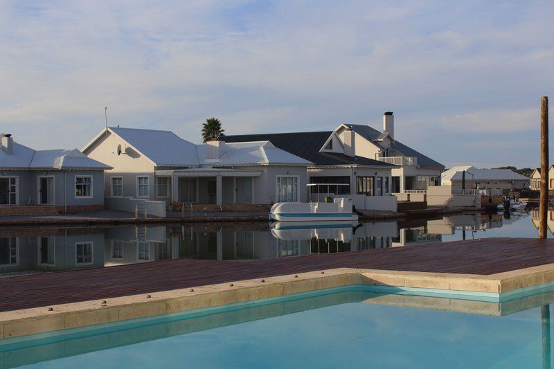 Waterside Living Marina Martinique 1404 Marina Martinique Jeffreys Bay Eastern Cape South Africa House, Building, Architecture, Palm Tree, Plant, Nature, Wood, Swimming Pool