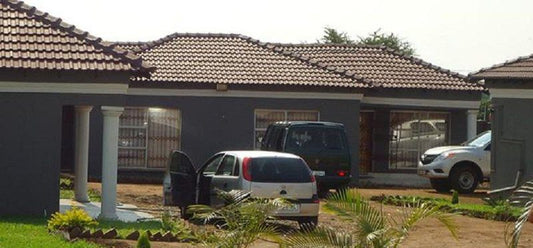 Modjiemedi Guest House Namakgale B Phalaborwa Limpopo Province South Africa Building, Architecture, House, Palm Tree, Plant, Nature, Wood, Car, Vehicle