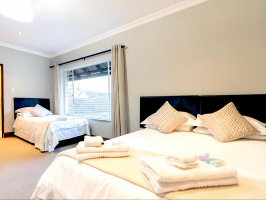 Family 4-bed Room @ Or Tambo Guest House