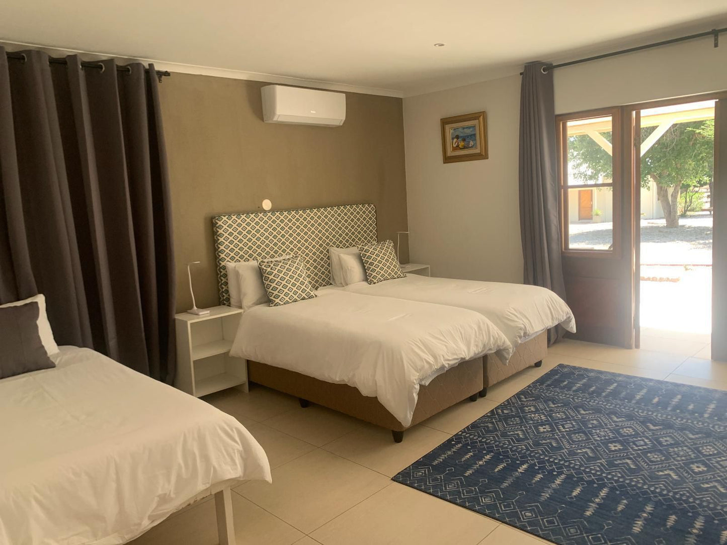 Otjibamba Lodge, Family Quadruple Room, Bedroom