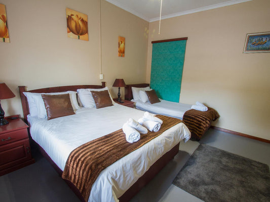 Queen & single with shower downstairs @ Ramasibi Bed & Breakfast