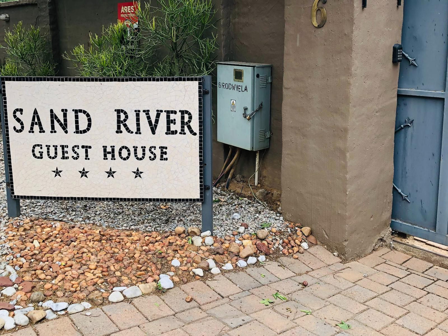 Sand River Guest House, Sign