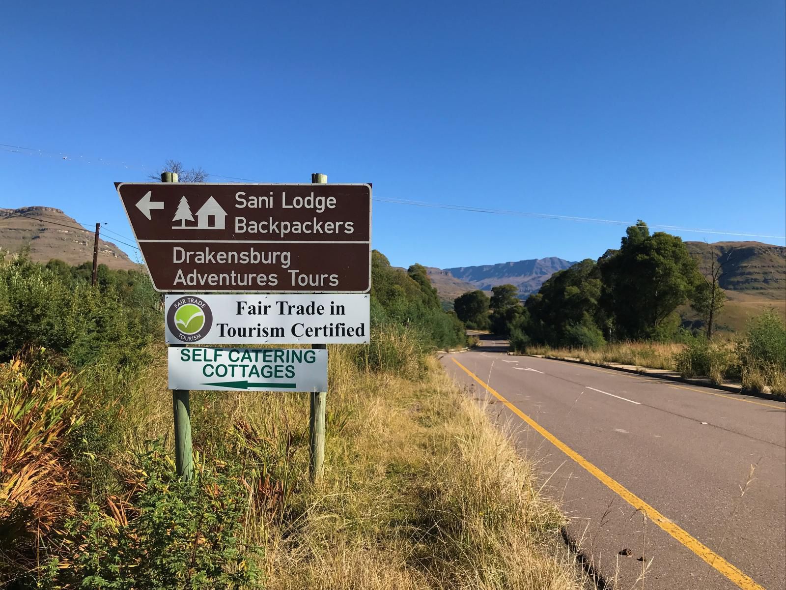 Sani Lodge & Cottages, Sign, Text