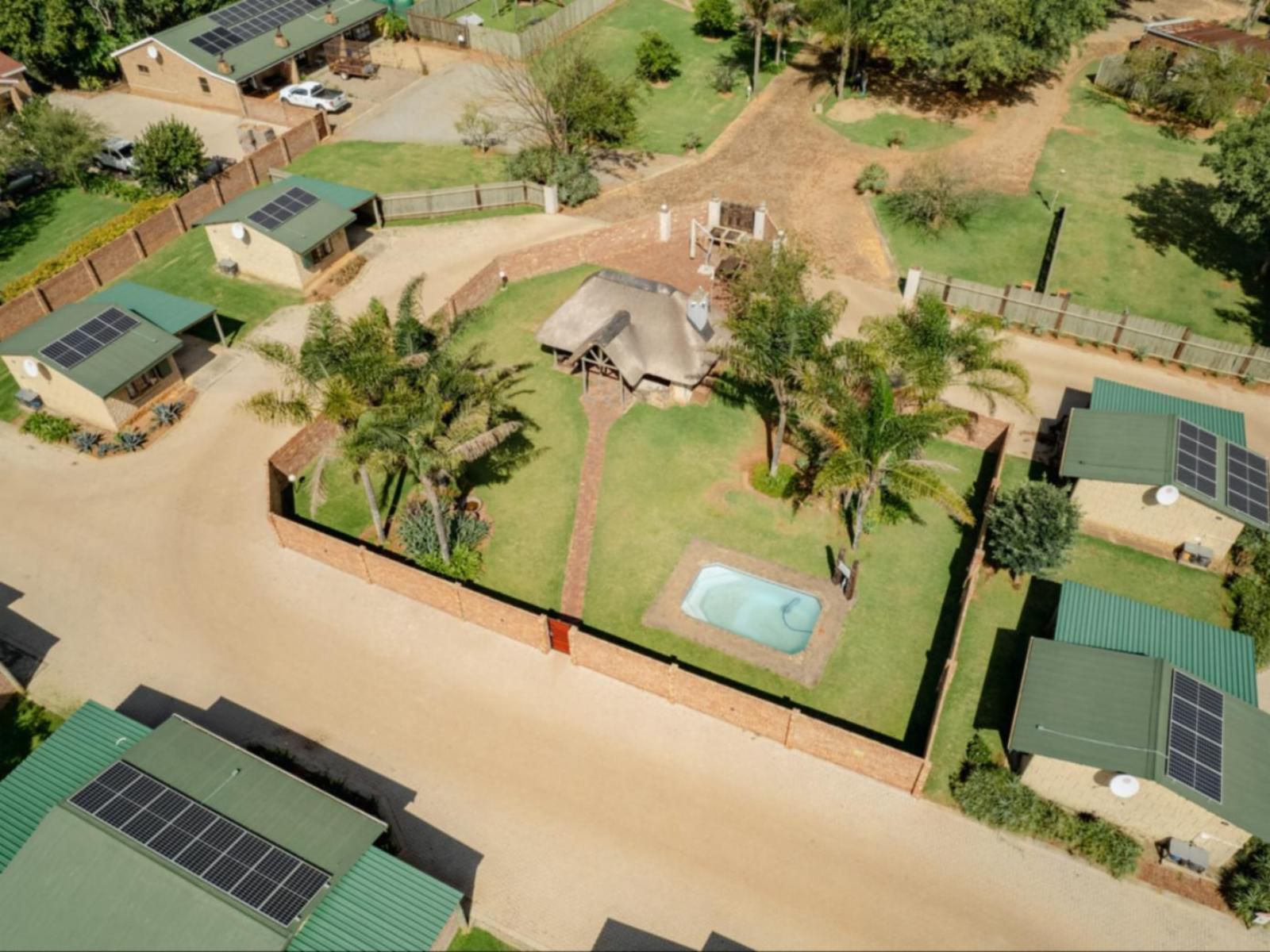 Sundowner Lodge And Caravan Park Piet Retief Mpumalanga South Africa House, Building, Architecture, Palm Tree, Plant, Nature, Wood, Aerial Photography, Swimming Pool