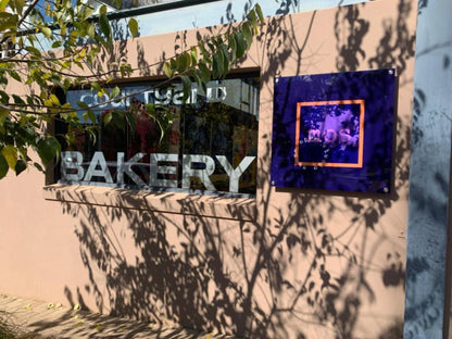 The Courtyard Cafe Clarens Free State South Africa Sign, Text, Wall, Architecture, Bakery Product, Food