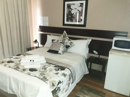 Tsessebe Guesthouse, Modern Luxury Twin Room, Bedroom